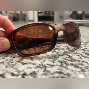 Men’s tortoise shell Costa sunglasses